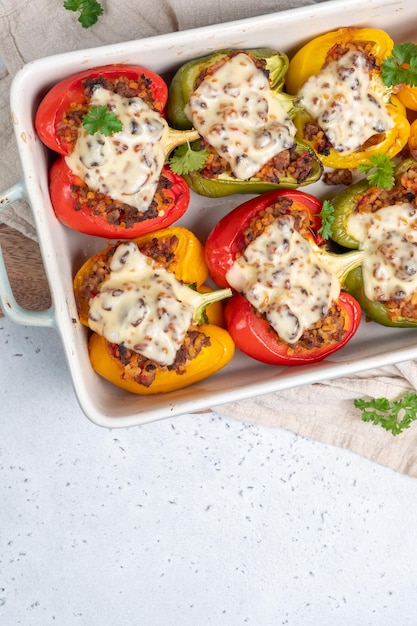 Colorful peppers stuffed with meat and bulgur