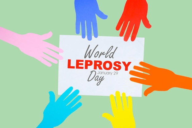 A colorful picture of hands with the words world leprosy day on it.