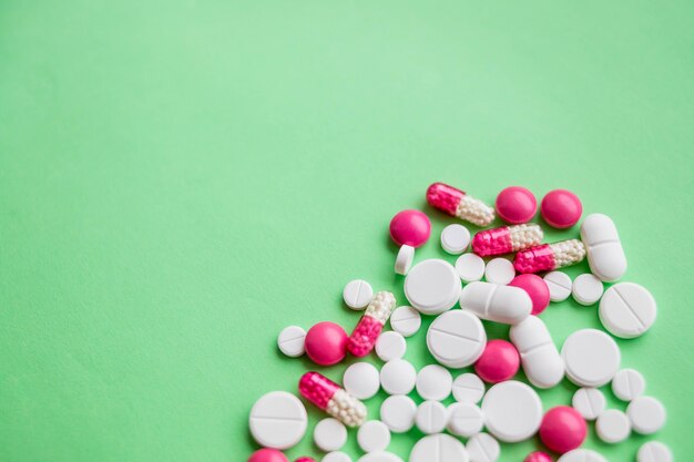 Colorful pills and drugs in close up.assorted pills and capsules in medicine. drugs of various kinds and different colors.