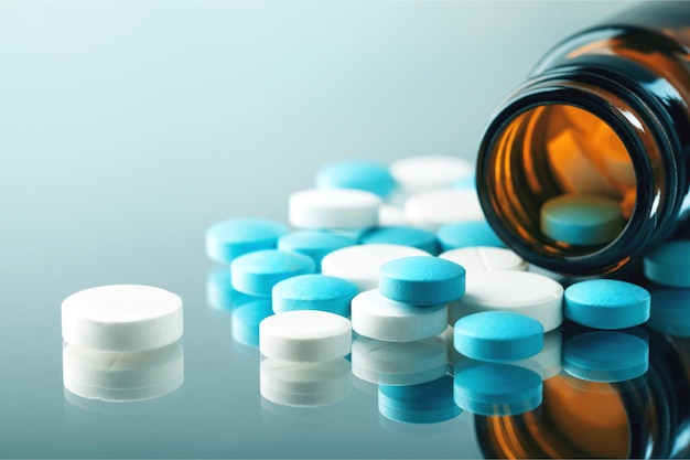 Colorful pills and tablets on background