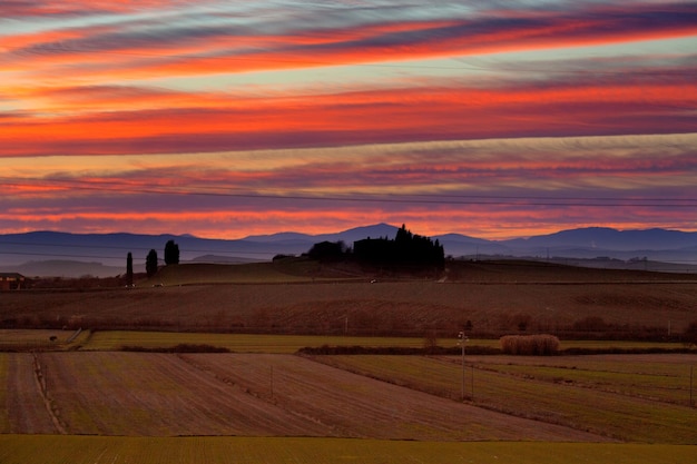 Colorful pink and orange sunset in the countryside