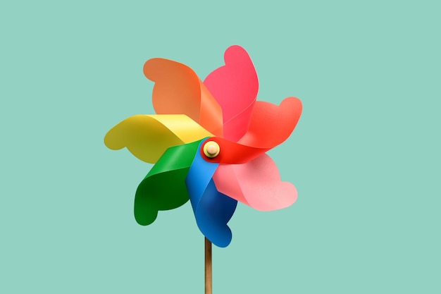 Colorful pinwheel against blue background
