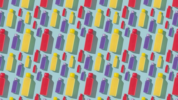 Colorful plastic bottles on a blue background