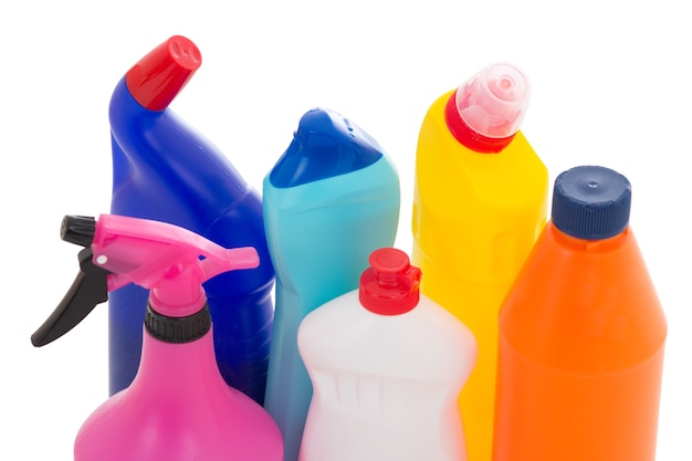 Colorful plastic bottles of dishwashing liquid isolated on white background