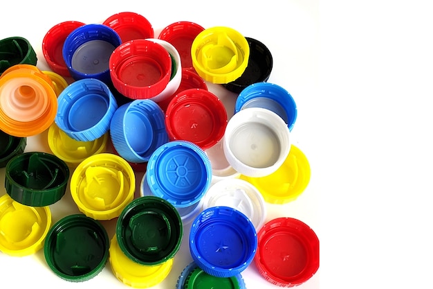 Foto collezione di tappi in plastica colorata