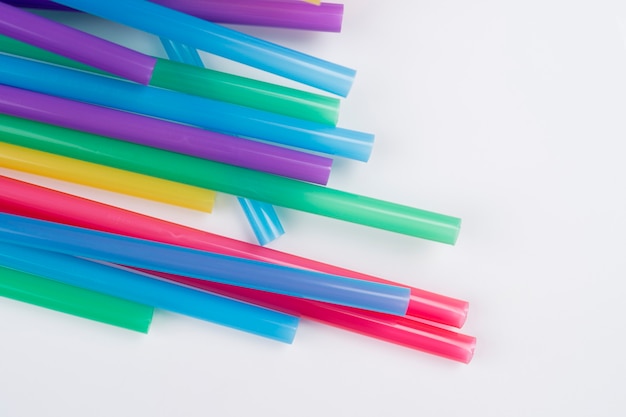 colorful plastic drinking straws isolated