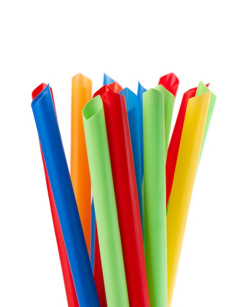 Colorful plastic straws, isolated  Wide straws for bubble tea cocktail.