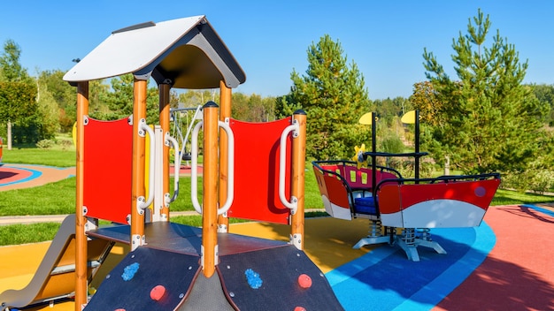 Colorful playground with slide in a city park