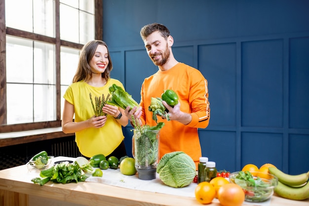 Colorful portrait of a yung couple with healthy food