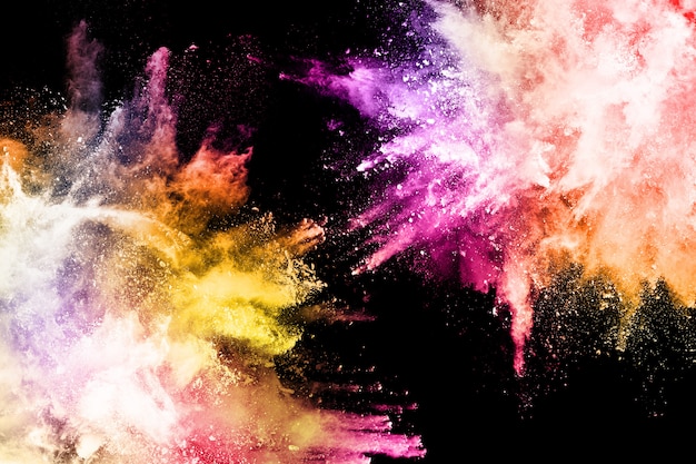 Colorful powder explosion on black background.