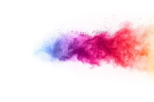 Photo colorful powder explosion on white background.