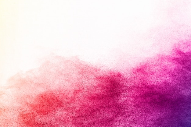 Colorful powder explosion on white background.  