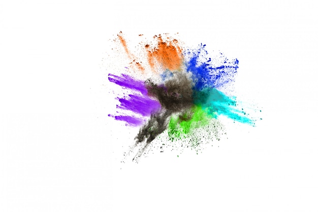 Photo colorful powder explosion on white background.