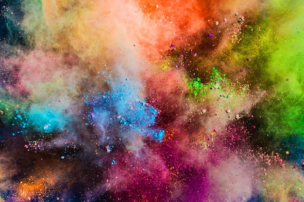 Foto polvere colorata che spruzza nell'aria.