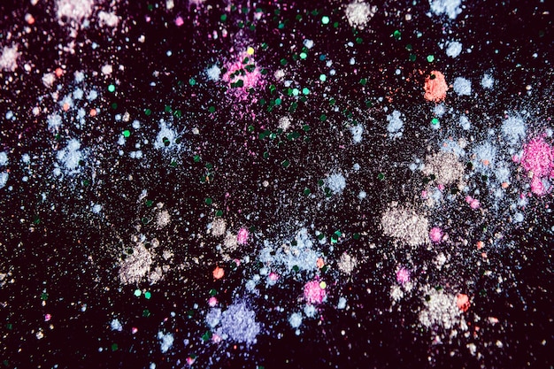 Colorful powdery star splashes top view