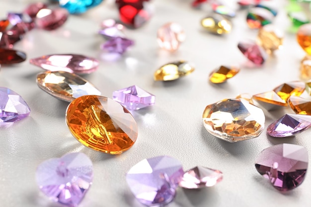 Colorful precious stones for jewellery on white background