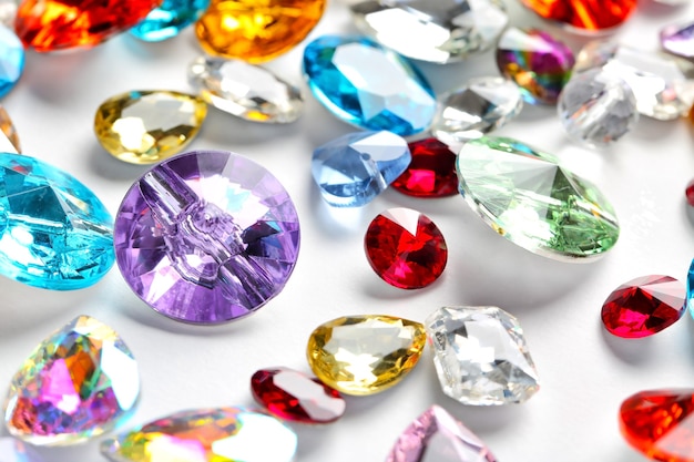 Colorful precious stones for jewellery on white