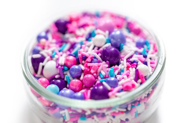 Colorful purple sprinkle blend on a white background.