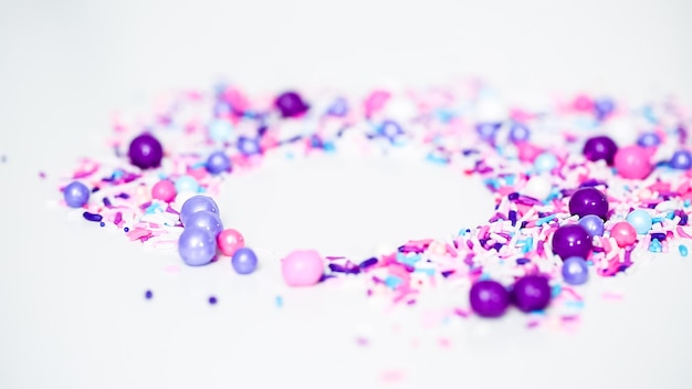 Colorful purple sprinkle blend on a white background.