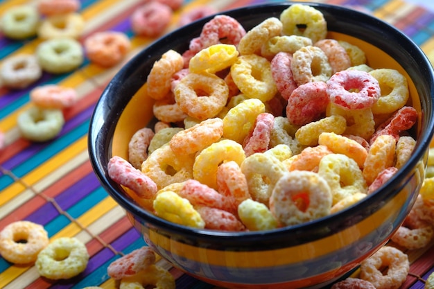 Photo colorful ring corn flakes on table cloth
