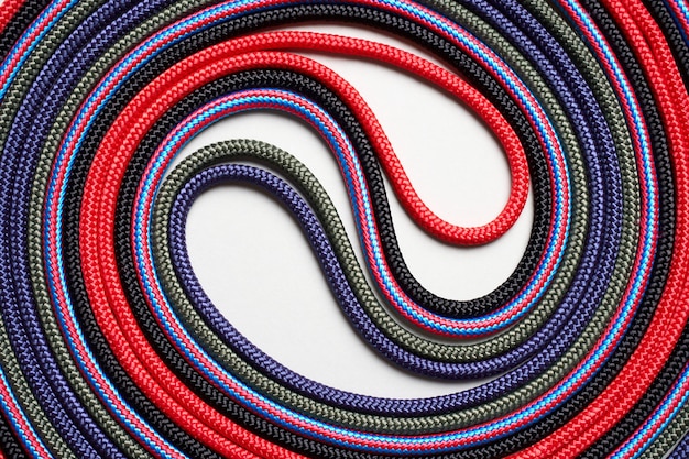 Photo colorful rope twisted on a white background