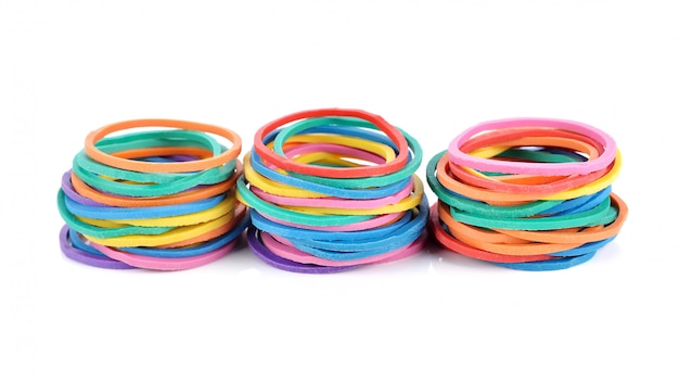 Photo colorful rubber bands isolated on white.