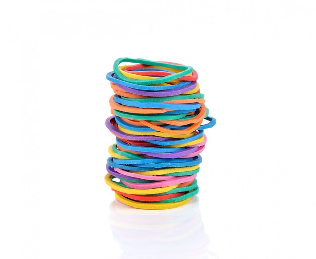 Photo colorful rubber bands on white background