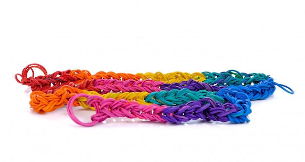 Colorful rubber bands on white background