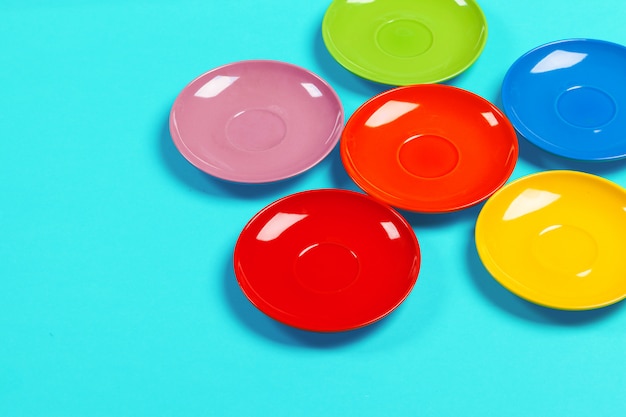 Colorful saucers on vibrant bright