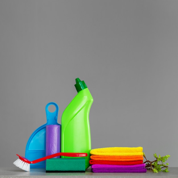 Colorful set of tools for cleaning the house and twigs 