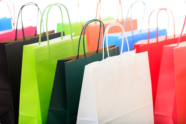 Colorful shopping bags on white background