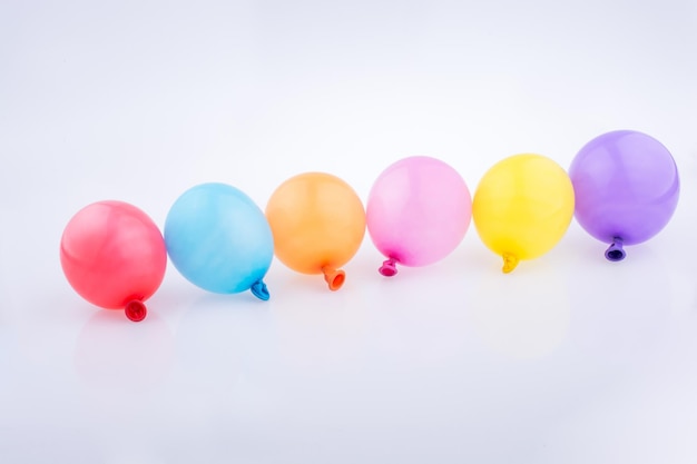 Colorful small Balloons in line