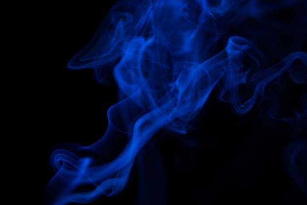 Colorful smoke close-up on a black background