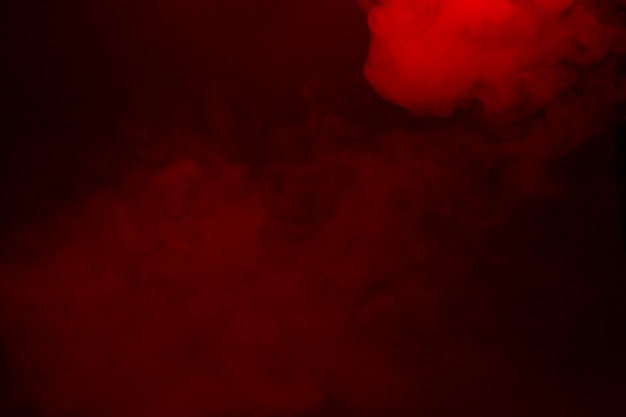 Primo piano di fumo colorato su sfondo nero