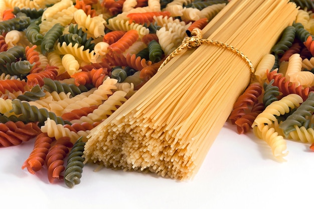 Colorful spaghetti pasta chef bunch isolated on white background pasta closeup