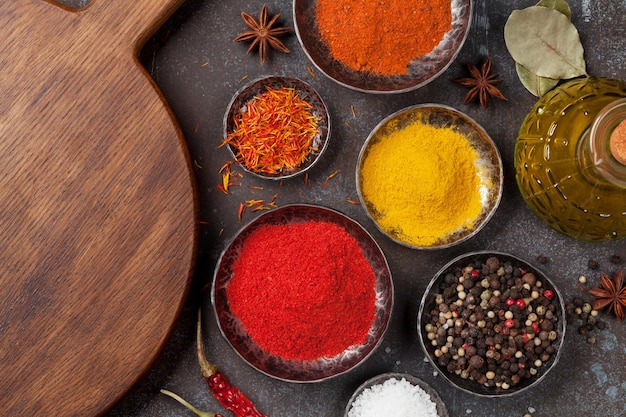 Colorful spices on stone table