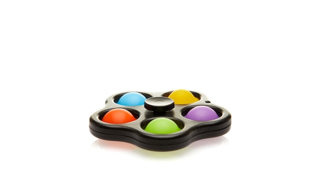 Colorful spinner and Push pop bubble sensory anti-stress toy, isolated.