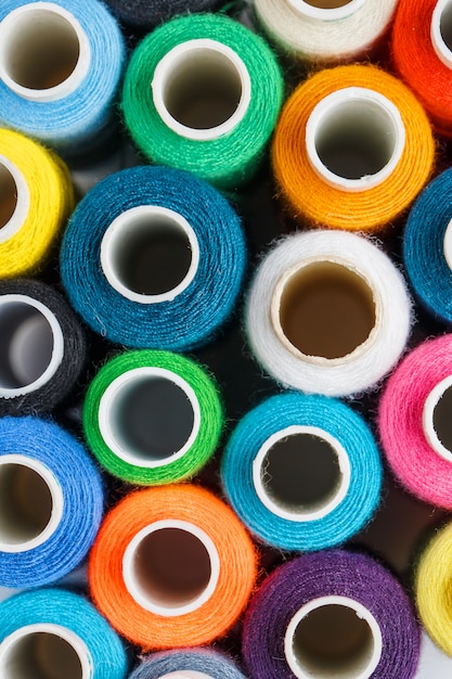 Colorful spools of sewing thread. Colored thread for sewing