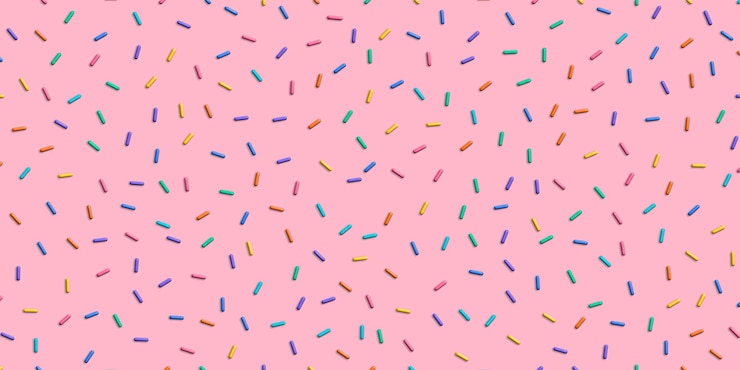 Photo colorful sprinkles banner background colorful falling decorative sprinkles background