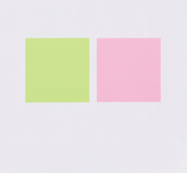 Photo colorful square note paper on white paper