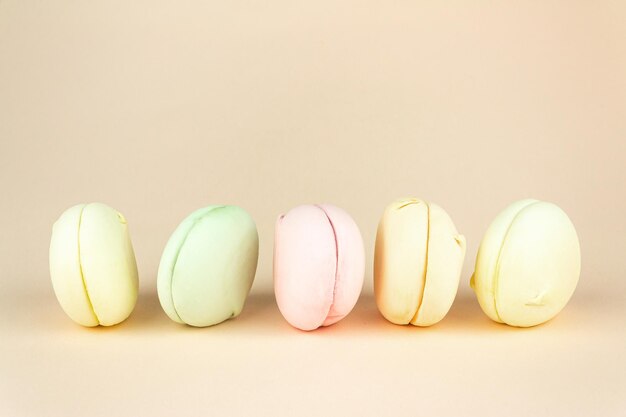 Colorful stacked marshmallows looks like macaroons Free space for text