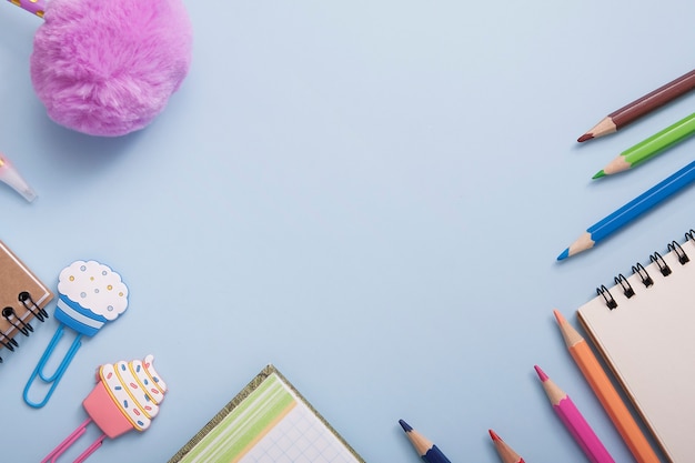 Colorful stationery isolated on blue