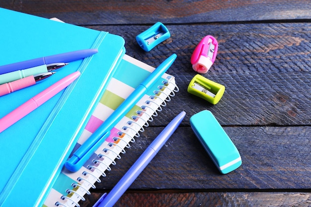 Colorful stationery on wooden table closeup