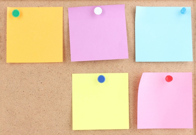 Colorful sticky notes on board