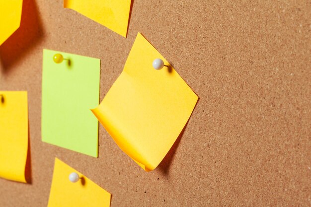 Colorful sticky notes with pushpins