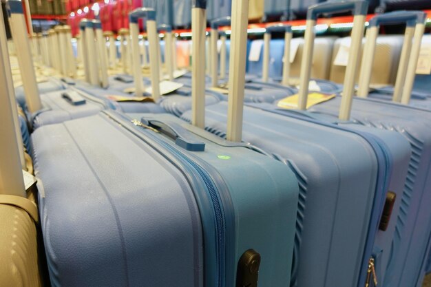 Colorful suitcases on floor top view