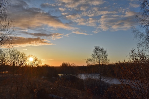 Colorful sunrise of the sun over a beautiful lake