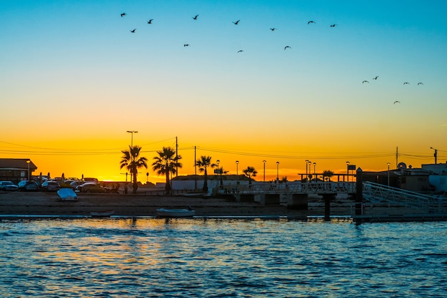 Colorful Sunset in Faro's Pier.