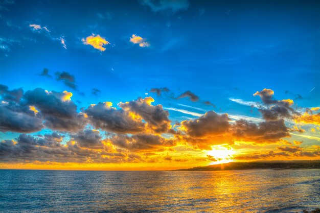 Colorful sunset over the sea in Sardinia Italy