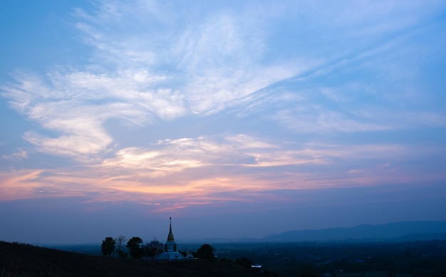 Colorful sunset and sunrise with clouds.Blue and orange color of nature.Many white clouds in the blue sky.The weather is clear today.sunset in the clouds.The sky is twilight.